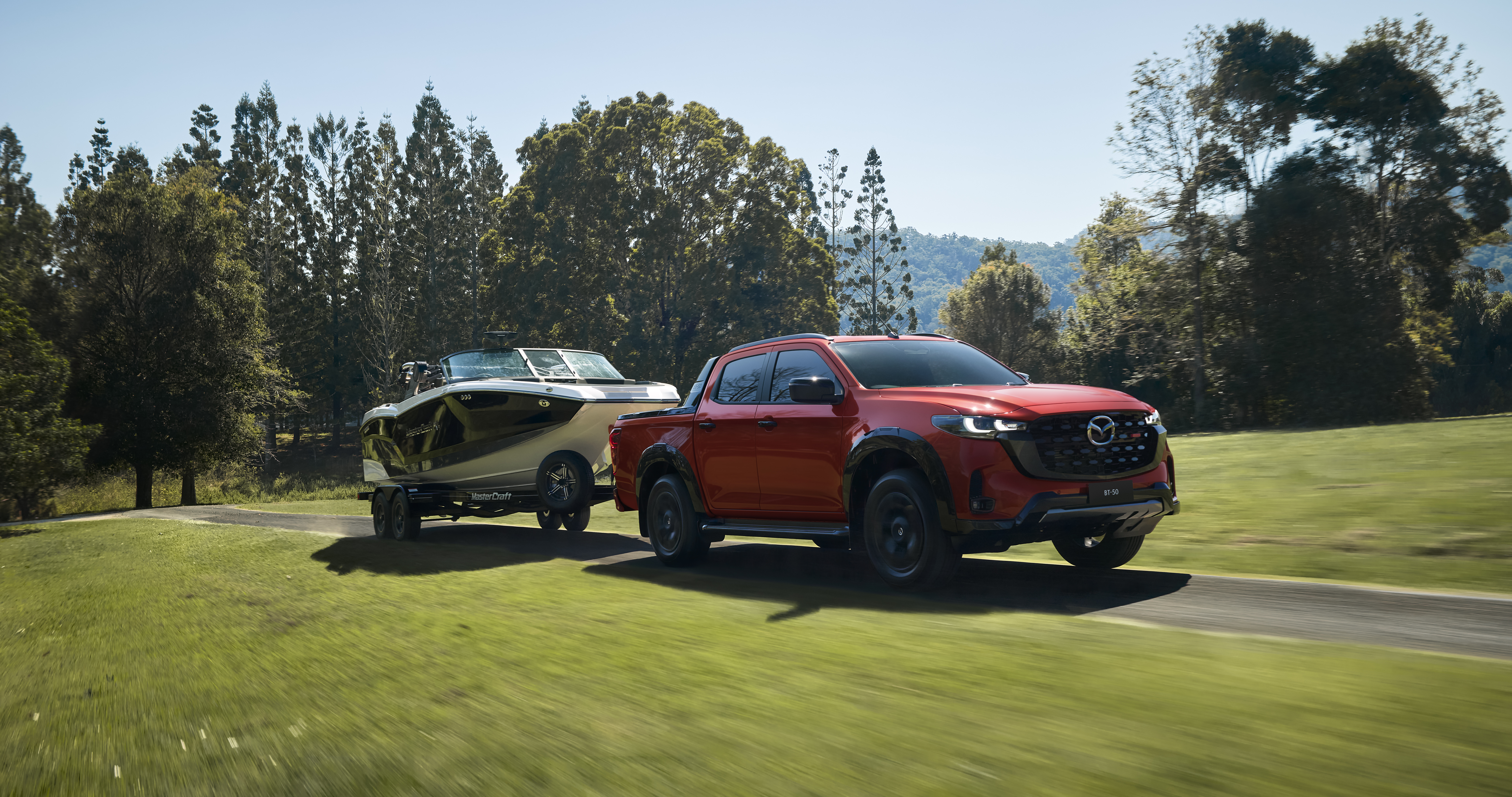 2024 BT 50 AUS RHD C105 SP Pkg EXT FQ Vermilion Latosol Metallic Running Towing Boat Until20271017